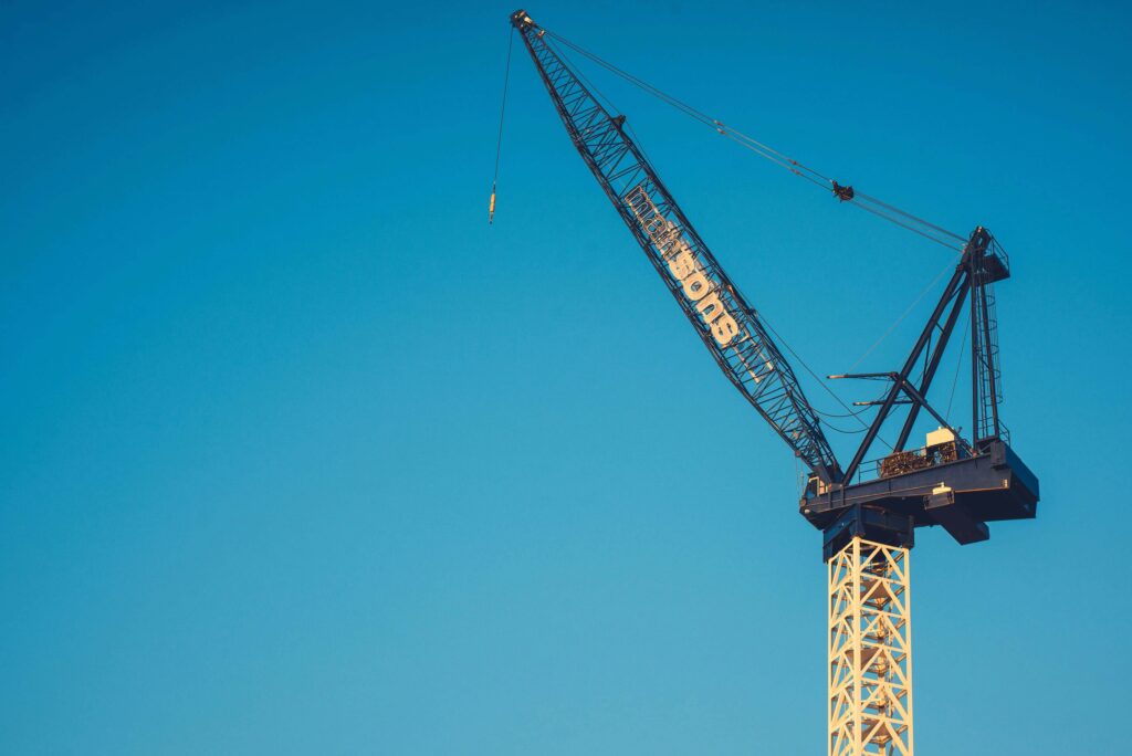 Crane being used with the sky in the background